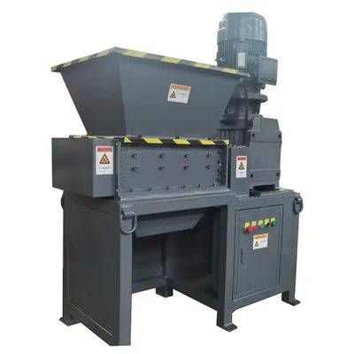 Machine voor het versnipperen van schroothout